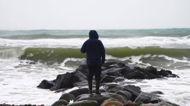 Man Winter Clothes Stands Sea Rocky Coast Watching Coming Storm — Video