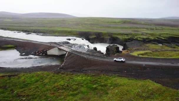 Aerial Car Driving Little Bridge River Cascades Iceland Camera Moves — Wideo stockowe