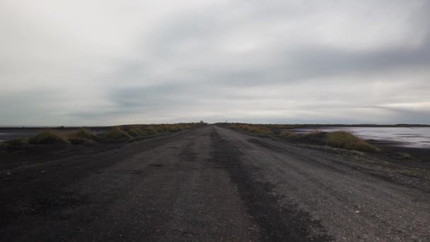 View Moving Car Bud Dirt Road River Iceland Overcast Day — Stock video