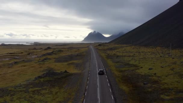 Aerial Car Driving Empty Coastal Road Iceland Road Mountains Fjords — Video Stock