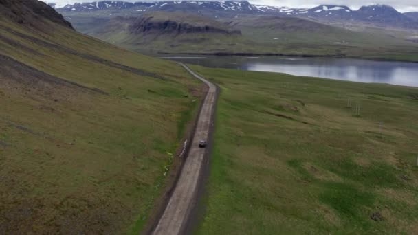 Aerial Car Driving Empty Rural Road Iceland Car Passes Majestic — Video Stock