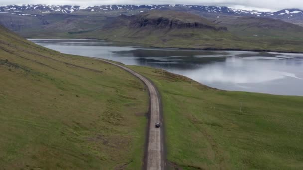 Aerial Car Driving Empty Rural Road Iceland Car Passes Majestic — Vídeo de Stock