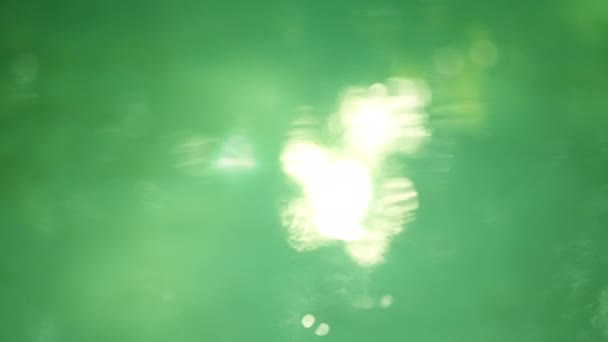 Defocused Sun Glare Reflections Water Surface Sunrays Flickering Water — Stockvideo