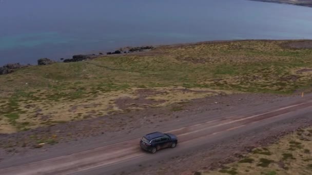 Aerial Car Driving Empty Rural Coastal Road Iceland Beautiful Nordic — Vídeo de Stock