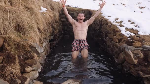 Young Man Falls Backwards Natural Pool Iceland Makes Funny Face — 图库视频影像