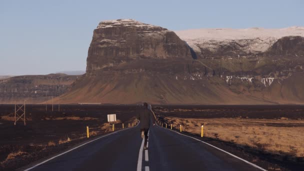 Back View Man Running Empty Asphalt Road Majestic Mountains Healthy — Video