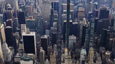 Aerial View of a New York Manhattan Skyscrapers Filmed From a Helicopter. Urban Cityscape.Wide Panning Shot