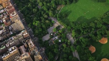 Aerial View of a New York Central Park Filmed From a Helicopter. Urban Cityscape. High Angle Panning Shot
