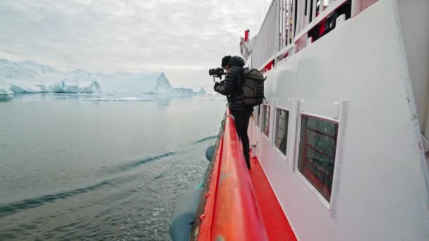 Wide Lockdown Slow Motion Shot Photographer Standing Deck Boat Filming — Stock videók