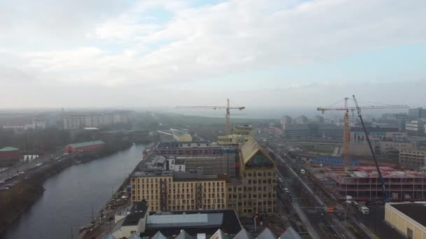 Wide Drone Flight Arcing City Malmo River Road Construction Cranes — 비디오