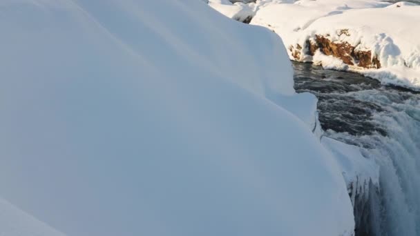 Wide Panning Shot Sunlit Godafoss Waterfall Skjalfandafljot River Snow Ice — Stockvideo