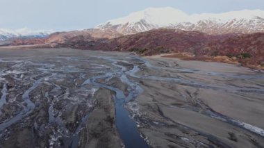 Drone Flight Over Hvannagil Canyon And Estuary Towards Mountains, Iceland