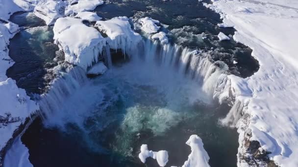 Wide Drone Arcing Overhead Skjalfandafljot River Godafoss Waterfall Snow Covered — Wideo stockowe