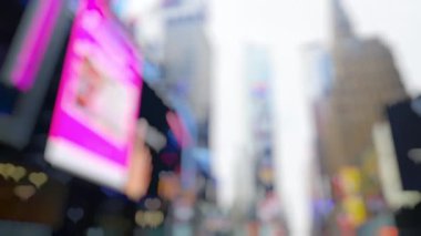 Low Angle Wide Defocussed Journey Through New York Streets Of Skyscrapers And Billboards