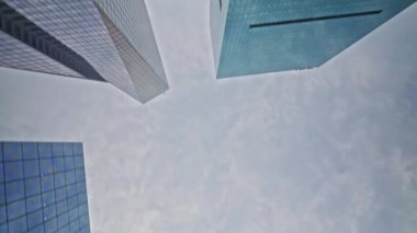 Point Of View Wide Low Angle View Moving Down Fifth Avenue With Skyscrapers And Trees Of New York