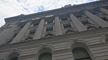 Wide Low Angle Dolly Shot Of New York City New York City David N. Dinkins Municipal Building Under Blue Sky Under Blue Sky