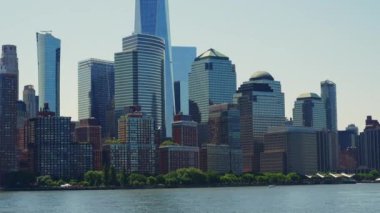 Modern High Rising Glass Buildings of Manhattan with Reflections on Windows, New York. View From the River