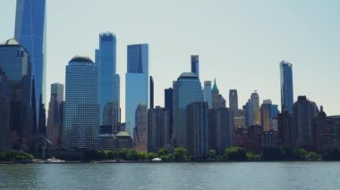 Modern High Rising Glass Buildings of Manhattan with Reflections on Windows, New York. View From the River