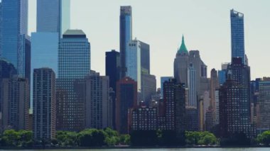 Modern High Rising Glass Buildings of Manhattan with Reflections on Windows, New York. View From the River