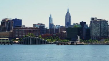 View From the River on Manhattan Financial District. Beautiful Cityscape of New York. Trucking Left Shot