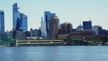 View From the River on Manhattan Financial District. Beautiful Cityscape of New York. Trucking Left Shot