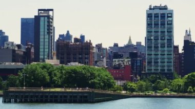 View From the River on Manhattan Financial District. Beautiful Cityscape of New York. Trucking Left Shot