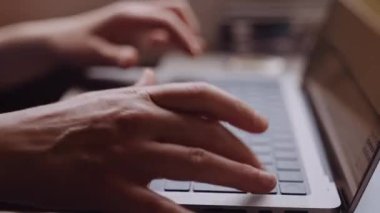 Close-up of Womans Hands Typing on a Laptop While Going by Train. Slow Motion Bokeh Shot
