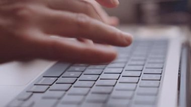 Close-up of Womans Hands Typing on a Laptop While Going by Train. Slow Motion Shallow Focus Shot