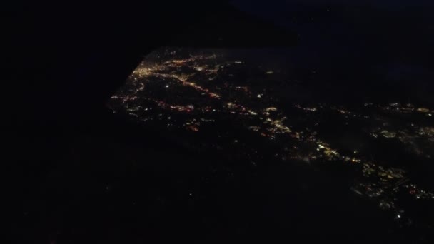 View Plane Window Night City Lights Flight Panoramic Shot — Stockvideo