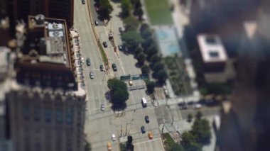 Wide Slow Motion High Angle Tilt Shift View Of Traffic In New York City Streets From Skyscraper