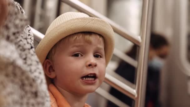 Portrait Little Blond Haired Boy Rides Subway Sits Metro Coach – Stock-video