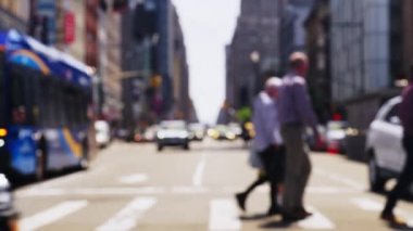Lockdown Wide Slow Motion Shot Of Traffic In Street With Pedestrians Crossing In New York City