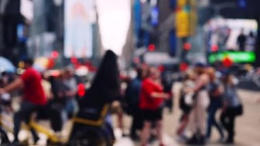 Wide Lockdown Slow Motion Defocussed Shot Of Pedestrians Crossing Street In New York City