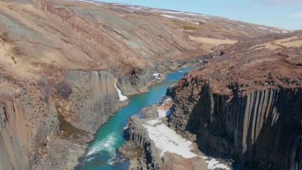 Wide Slow Motion Drone Flight River Running Studlagil Canyon Glacier — Stockvideo