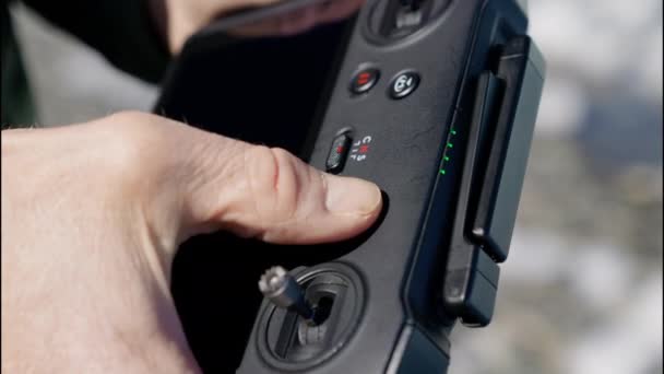 Close Drone Remote Control Mans Hands Man Presses Start Button — Stockvideo