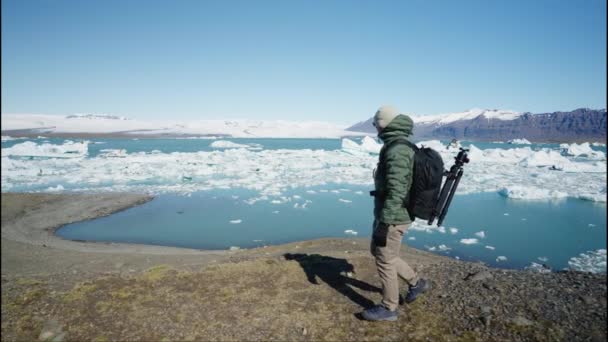 Man Photographer Backpack Tripod Camera His Hand Walks Hill Front — Stock Video