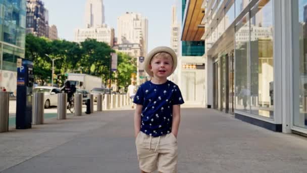 Medium Slow Motion Tracking Shot Boy Hat Hands Pockets Walking — Vídeo de Stock