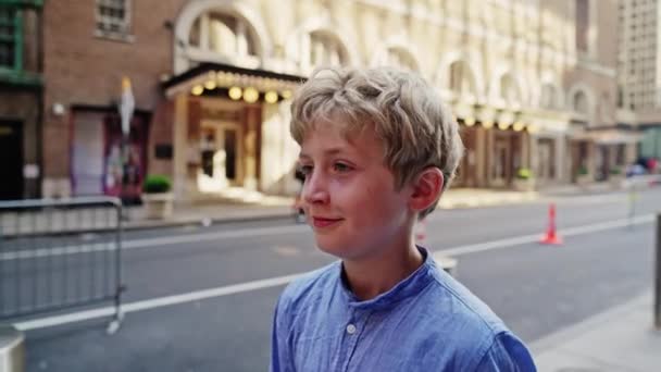 Medium Slow Motion Handheld Tracking Shot Young Blond Boy Walking — 图库视频影像