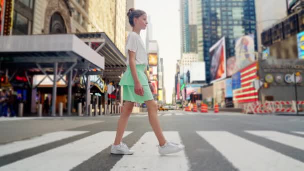 Handheld Wide Tracking Slow Motion Shot Young Girl Using Pedestrian – Stock-video