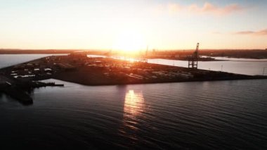 Wide Slow Motion Drone Flight At Dawn Over Industrial Harbour And Seaport Of Aarhus, Jutland, Denmark