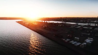 Wide Slow Motion Drone Flight At Dawn Over Industrial Harbour And Seaport Of Aarhus, Jutland, Denmark