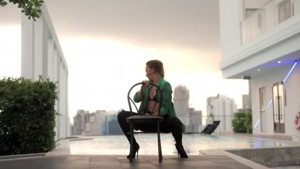 Wide Slow Motion Dolly Shot Sensuous Dancer Kneeling Moving Chair — Stok Video