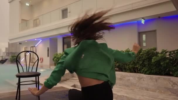 Slow Motion Wide Dolly Shot Dancer Spinning Wind Bra Green — Video