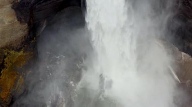 Aerial of Majestic Haifoss Waterfall. Spectacular Scenery of Iceland.  Slow Motion High Angle Shot. Camera Moves Up Along the Water Flows