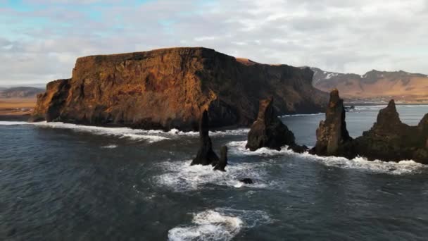 Wide Drone Flight Arcing Sea Stacks Rocky Coastline Iceland — Stock Video