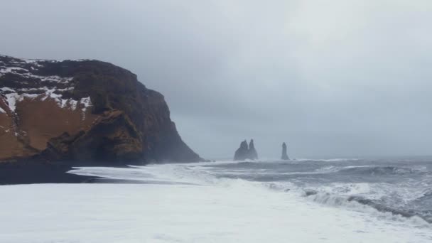 Wide Drone Flight Pulling Back Misty Coastline Black Sand Beach — Stock Video