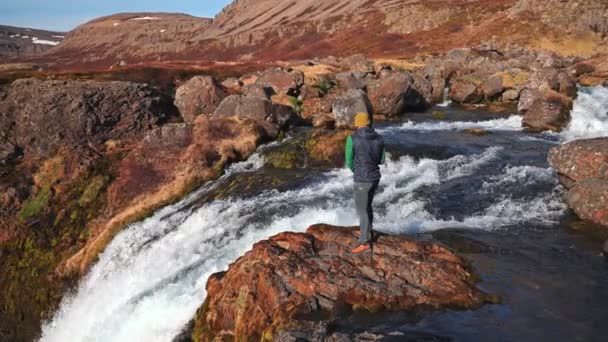Wide Panning Slow Motion Shot Photographer Standing Rocks Dynjandi Waterfall — Video