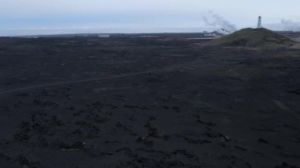 Aerial Black Volcanic Sand Field Lighthouse Background Epic Landscape South — 图库视频影像