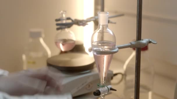 Handheld Close Shot Scientist Pouring Liquid Beaker Flask Shaking Adjusting — Stok Video