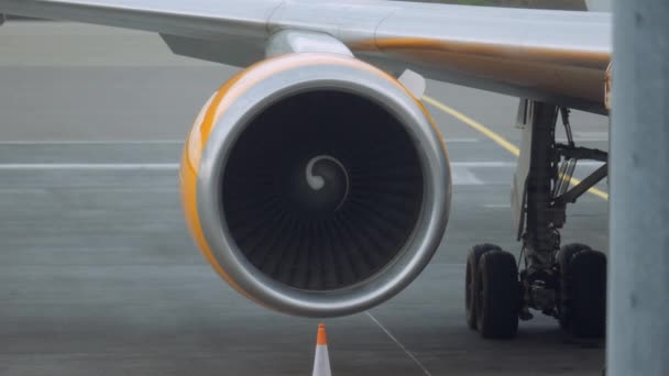 Handheld Wide Slow Motion Shot Airplane Engine Turbine Spinning Runway — Stock video